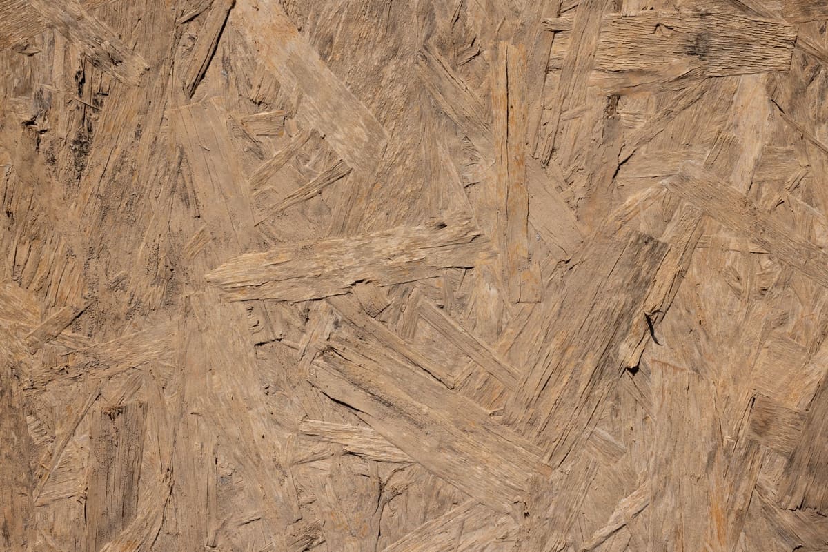 Clean bare plywood subfloor prepared for a new floor covering