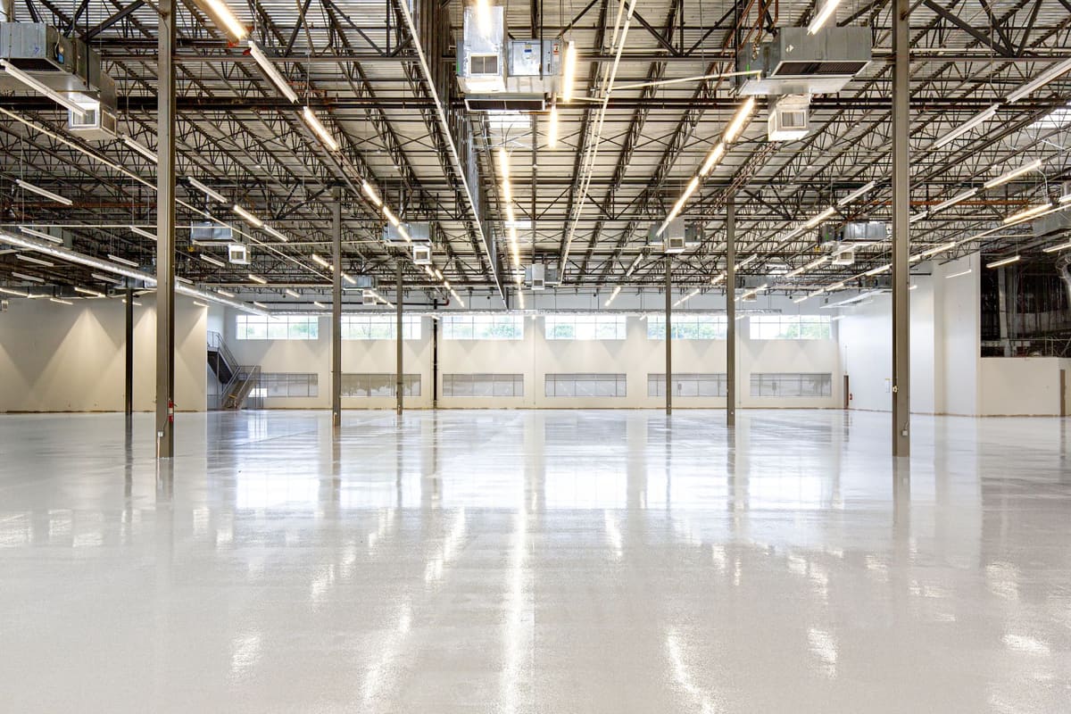 Concrete warehouse floor stripped bare after floor demolition