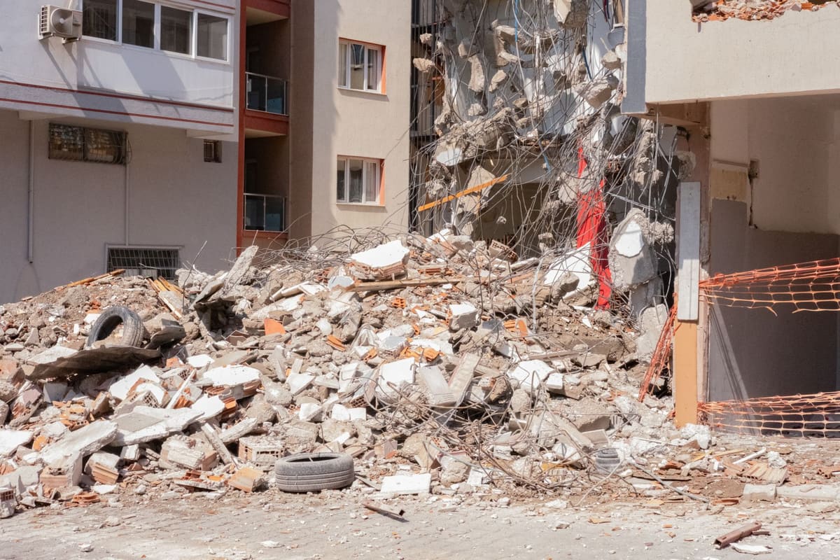 Demolition rubble and debris stacked for haul-off and disposal