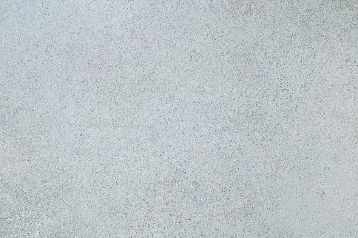 Swept bare concrete substrate after a floor demolition, ready for new flooring